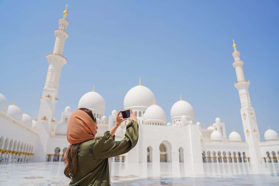 Abu Dhabi: Guided Walking Tour at Sheikh Zayed Grand Mosque - Reflective pools and the final photo stops