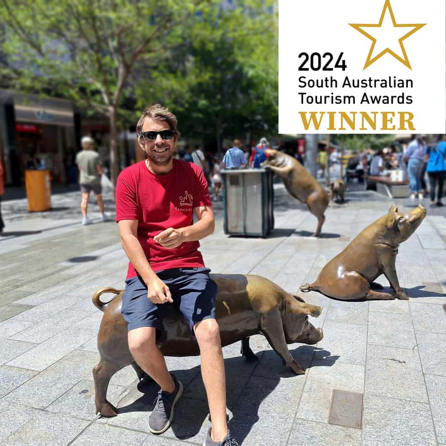 Adelaide: Guided Ultimate Walking Tour with Drink and Snack - Victoria Square and Rundle Mall show two sides of the city