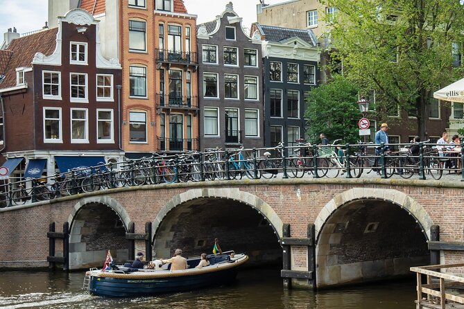 Amsterdam: Cultural Highlights in English/German/Italian - Starting at the National Monument on Dam Square