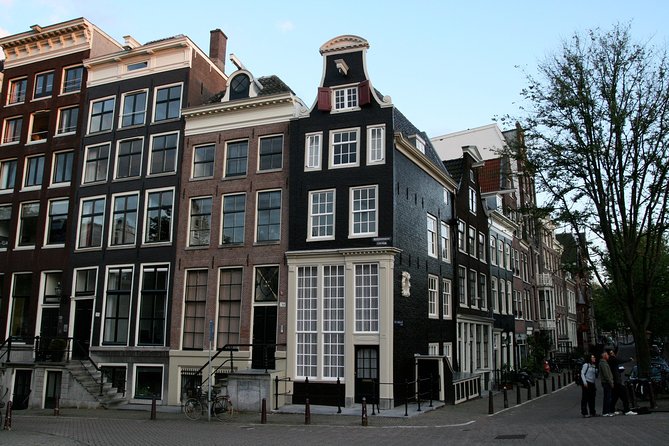 Amsterdam Highlights Walking Tour: Small Group Experience - Westerkerk, the Royal Palace, and the route details to clarify