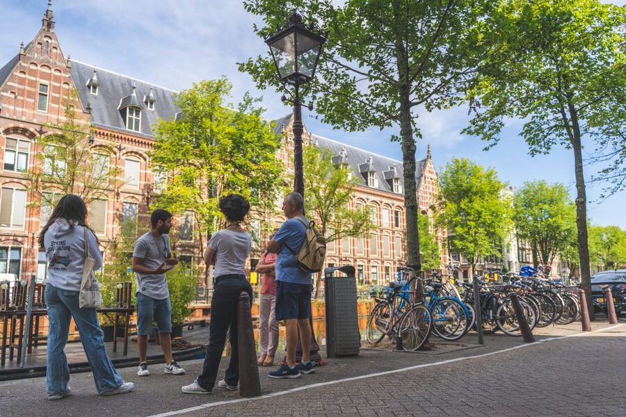 Amsterdam Small-Group Walking Tour - Pace, weather, language, and access