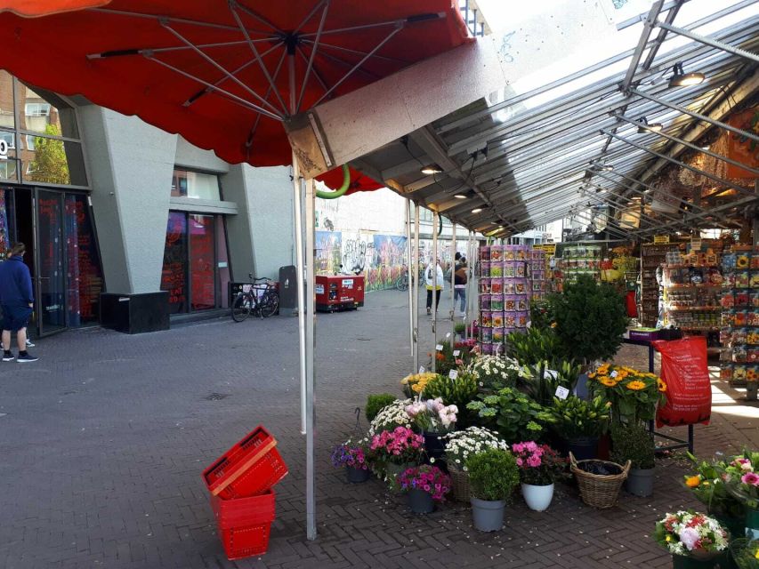 Amsterdam Walking Tour and Canal Cruise - A four-hour introduction that links streets and canals