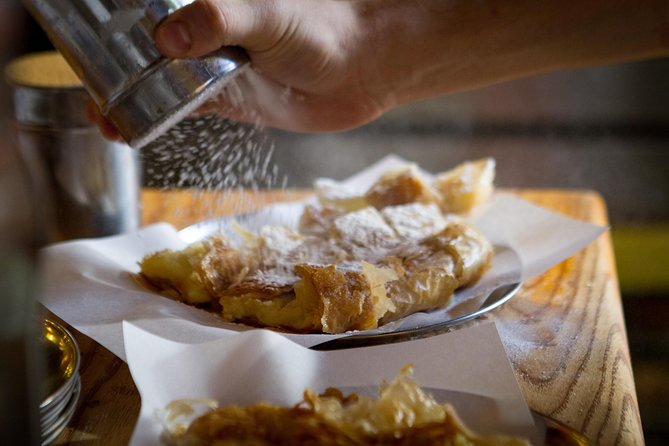Athens Authentic Greek Food Walking Tour (Small Group) - How the guide affects the experience