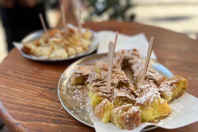 Athens Food Tour with 10+ Tastings of Greek Traditional Dishes - Meze, dips, seafood, and the secret dish