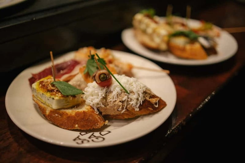 Barcelona: Food Walking Tour with Tapas and Wine - Wine, cava, and vermouth between the bites
