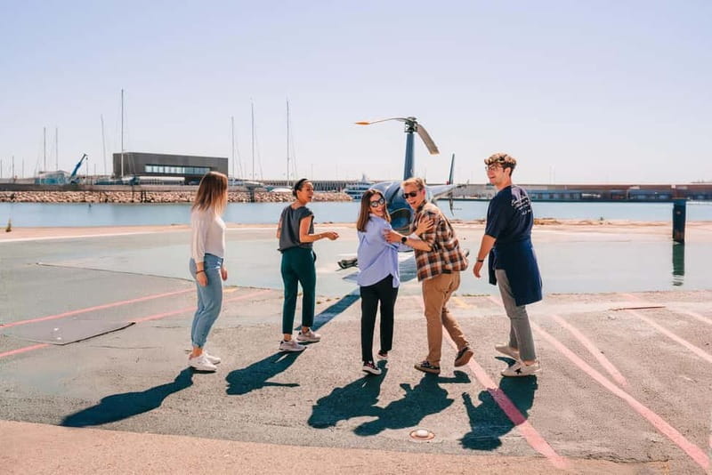 Barcelona: Helicopter Flight, Boat Ride, and Walking Tour - Timing, languages, and group size
