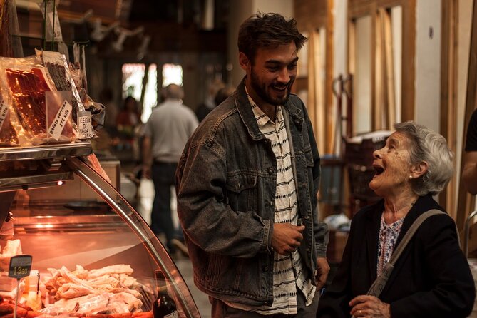 Barcelona Private Food Tour: Tapas, Paella & 8+ Food Tastings - La Barceloneta, seafood, and the sea at the finish