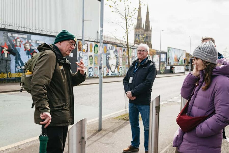 Belfast: The Troubles Walls & Bridges Guided Walking Tour - Standing beside the Peace Walls