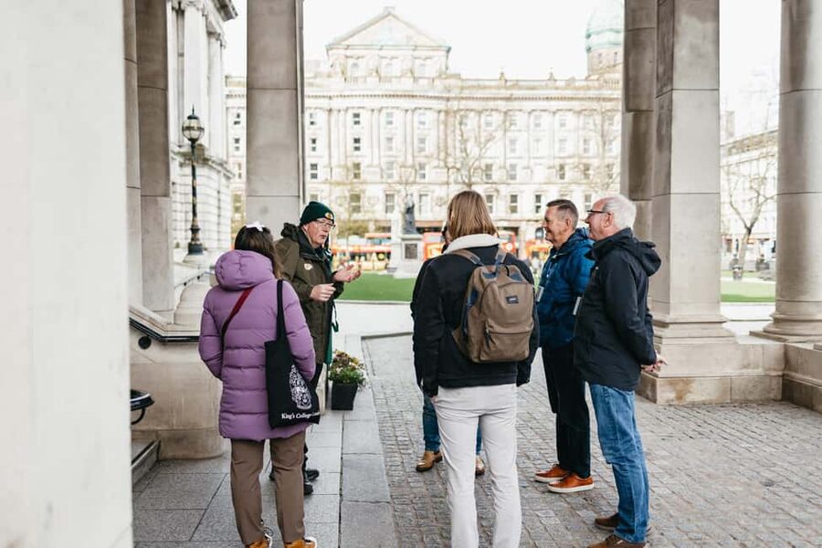 Belfast: The Troubles Walls & Bridges Guided Walking Tour - Returning through the gates and back to central Belfast