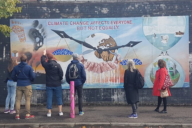 Belfast Troubles Murals Street Art and Peace Wall Walking Tour - The International Mural Wall on Divis Street