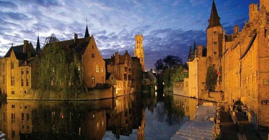 Bruges: Guided Walking Tour - Huidenvettersplein and the route toward Burg Square