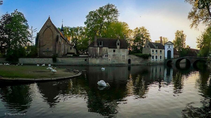 Bruges: Private Historical Highlights Walking Tour - Burg Square and the city’s working past