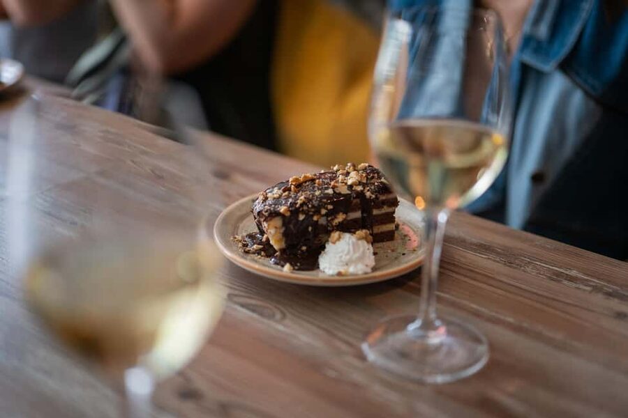 Budapest Guided Food Walking Tour with Drinks Included - The guides shape the evening