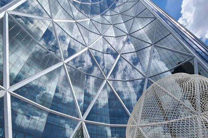 Calgary City Highlights 3 Hour Walking Tour | Gratuity-Based - City Hall and the St. Louis Hotel connect old Calgary