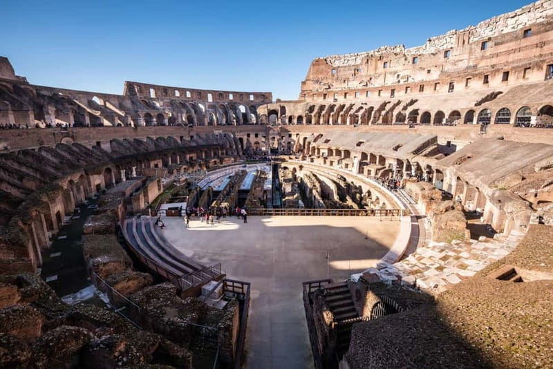 Colosseum, Forum & Palatine Hill Guided Walking tour - Entering the Colosseum and picturing the arena