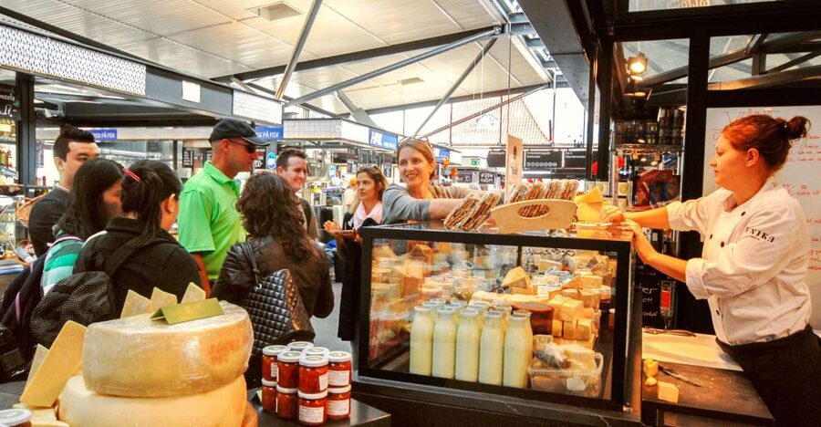 Copenhagen’s oldest and original food tour (Est. 2011). - A hot pastry and Copenhagen’s old center