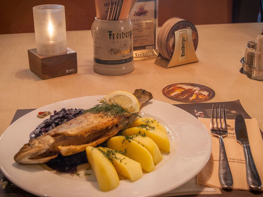 Dresden: Walking Tour with a Night Watchman including a Meal - What the German-language guiding is like