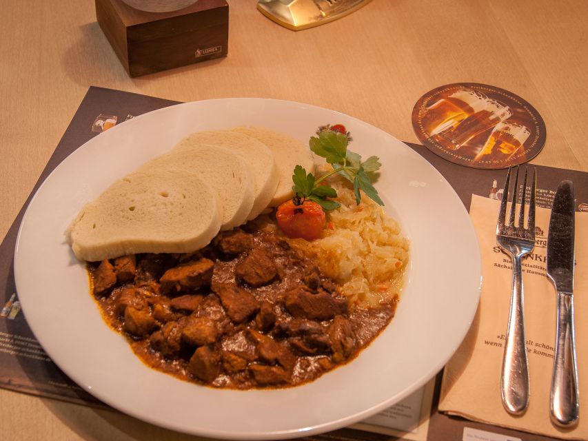 Dresden: Walking Tour with a Night Watchman including a Meal - Dresden after dark, without overplanning