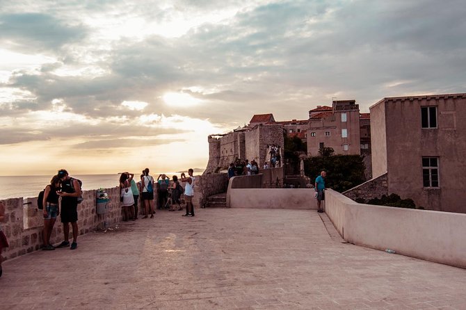 Dubrovnik: Ancient City Walls & Wars Walking Tour - Heat, stairs, restrooms, and group size