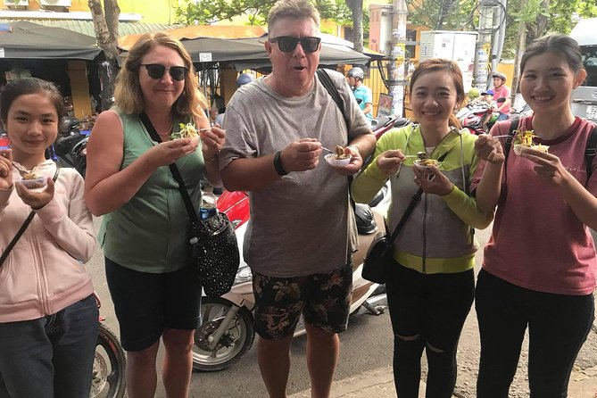 Evening Walking Food Tour, folk game and lantern boat - Folk bingo and Dap Nieu