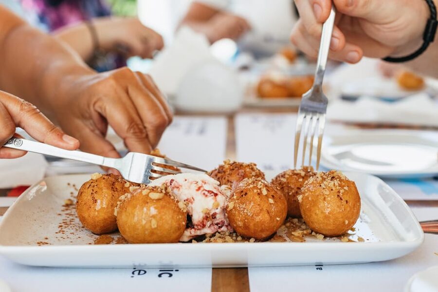Fira: Guided Foodie Walking Tour with Tastings - Meeting in Firostefani beside the blue domes