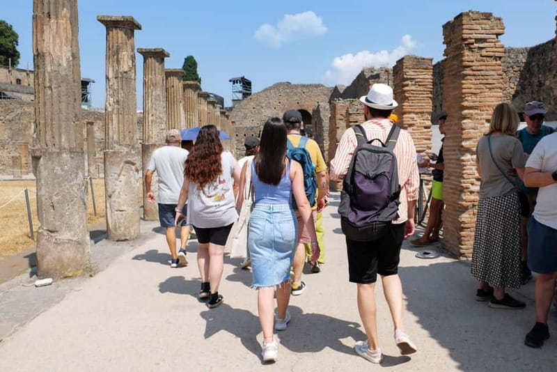 From Naples: Guided tour of Pompeii skip-the-line and round-trip train - Two hours among temples, theaters, baths, and frescoes