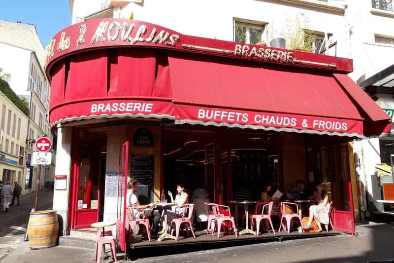 German private Walking Tour through Montmartre & Passages - From Moulin Rouge into Montmartre