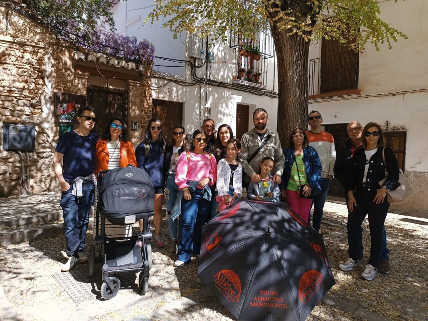 Granada: Historic Center and Lower Albaicin Walking Tour - Meeting the guide beside the Catholic Monarchs