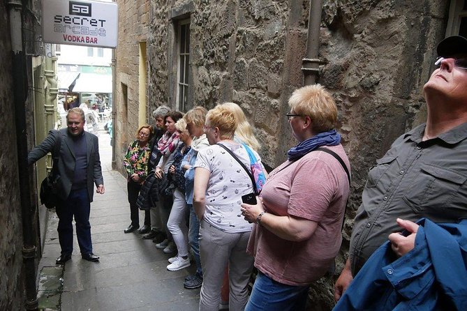 Guided Edinburgh Private Walking Tour - Holyroodhouse at the foot of the Royal Mile