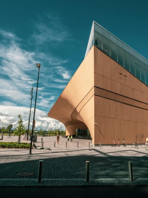 Helsinki: Architectural Highlights Guided Walking Tour - Runeberg, Academic Bookstore, and Rautatalo