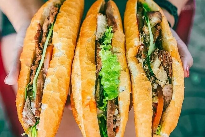 Ho Chi Minh City Street Food Tour & Sightseeing By Motorbike - Bánh khọt among the Nguyễn Thiện Thuật apartments