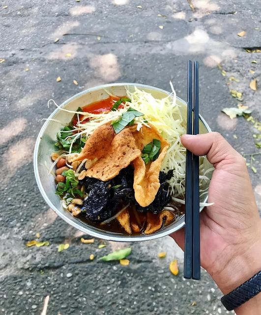 Ho Chi Minh: Original Walking Street Food Tour with Foodies - District 10 adds heavier local flavors