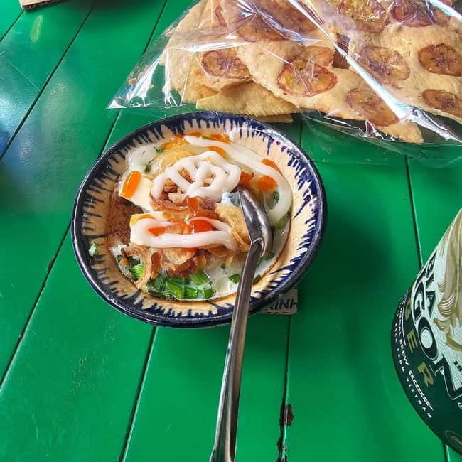 Ho Chi Minh: Original Walking Street Food Tour with Foodies - Bánh mì and bánh xèo show two sides of Saigon
