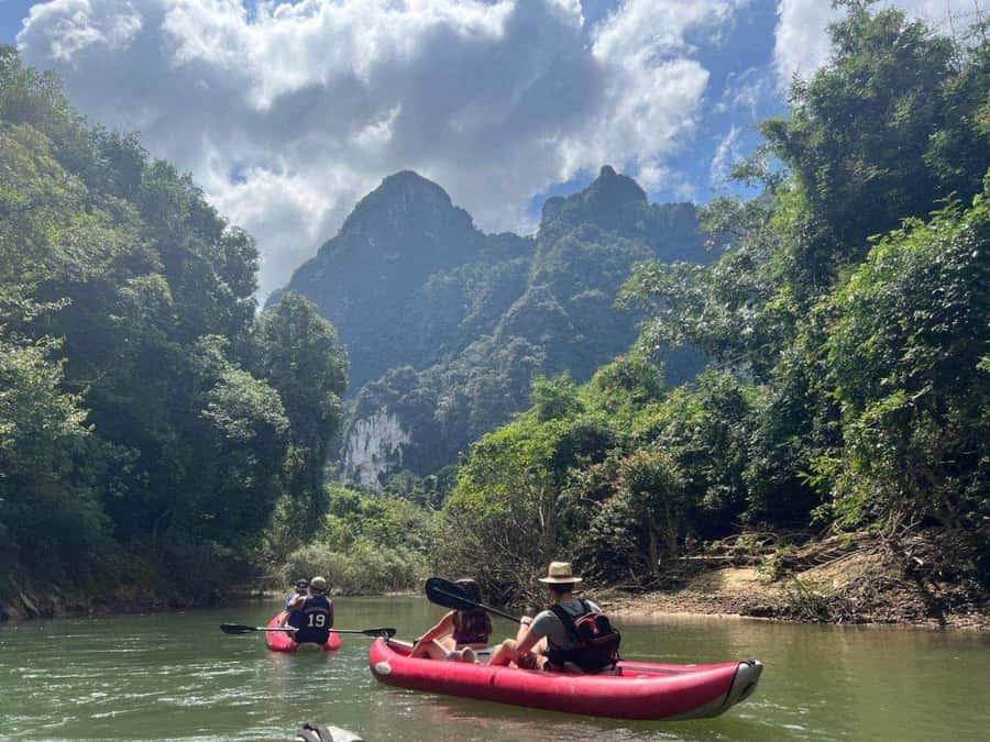 Khao Lak: Full-Day Khao Sok Jungle Walk and Canoeing Tour - Wat Tham Pla and the monkey encounter