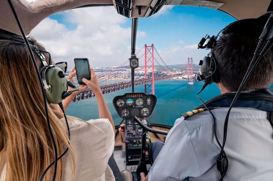 Lisbon: Helicopter Ride, Boat Trip, & Old Town Walking Tour - Baixa, Praça do Comércio, and the river