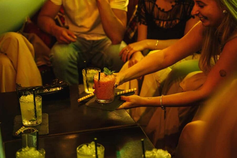 Lisbon: Private Dark History Walking Tour with Drinks - Ending the evening at a Bairro Alto club