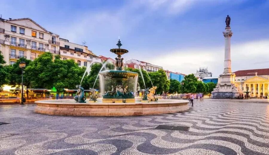 Lisbon Through the Eyes of a Local - Food and Walking Tour - Walking into Alfama for ginjinha and chocolate