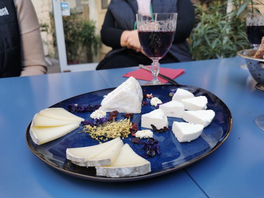 Lyon: Food Walking Tour with a Local Guide - Stop one: Lyon’s cold cuts and red wine