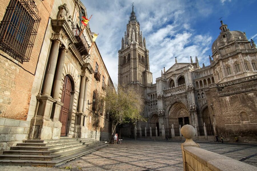 Madrid: Day Trip to Toledo with Walking Tour & Small Group - Entering Toledo Cathedral at Plaza del Ayuntamiento