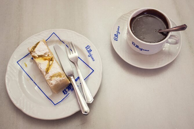 Madrid Historic Centre Food Tour with Authentic Tapas & Wines - Starting on Calle Mayor and entering old Madrid