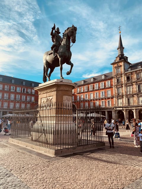 Madrid: Welcome to Madrid Guided Walking Tour in English - Almudena Cathedral and the city’s changing styles