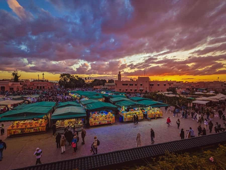 Marrakech: Souk by Night Medina Guided Walking Tour. - Tea on a rooftop above the square