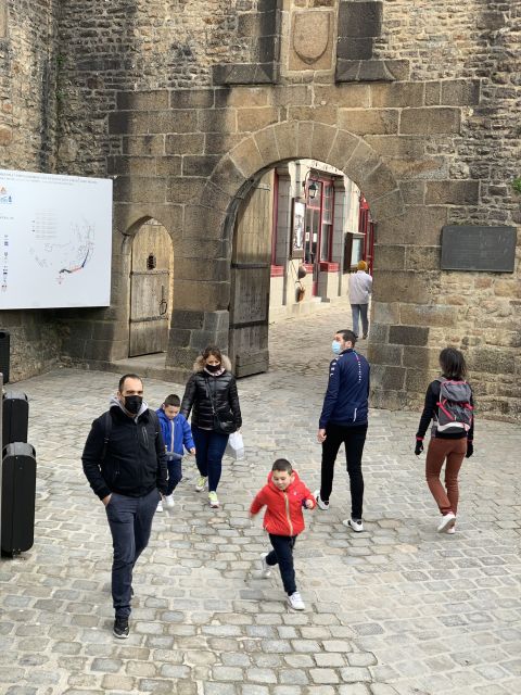 Mont Saint Michel: Walking Tour & Optional Abbey Ticket - Finding the meeting point and handling the shuttle