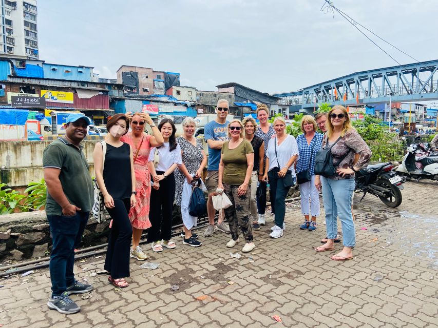 Mumbai: Dharavi Slum Walking Tour by First Female Tour Guide - From commercial lanes to family life