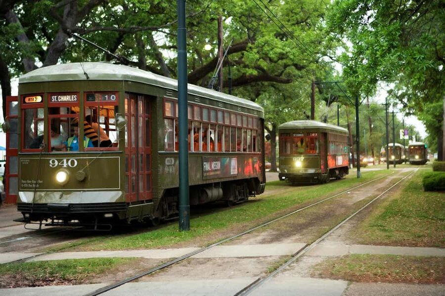 New Orleans: City and Cemetery Bus Tour Garden District Walk - St. Charles Avenue, streetcars, and Mardi Gras routes