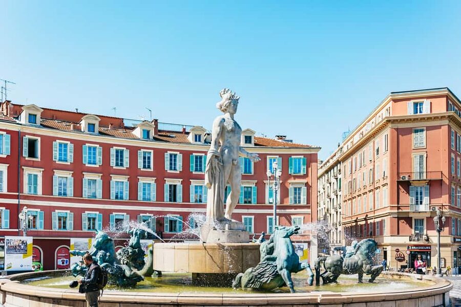 Nice: Old Town & Castle Hill Informative Guided Walking Tour - Place Massena and its red facades
