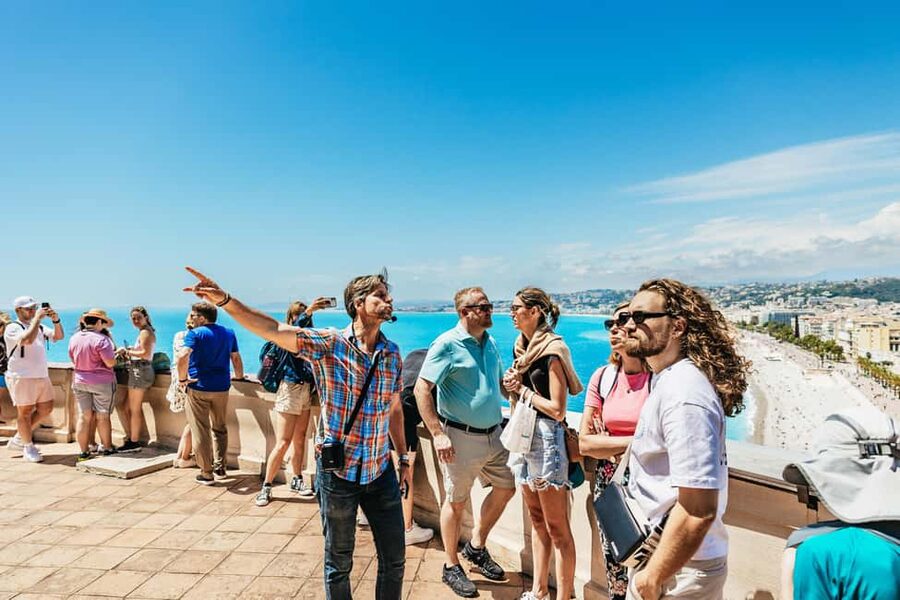 Nice: Old Town & Castle Hill Informative Guided Walking Tour - Entering Vieux Nice through narrow lanes