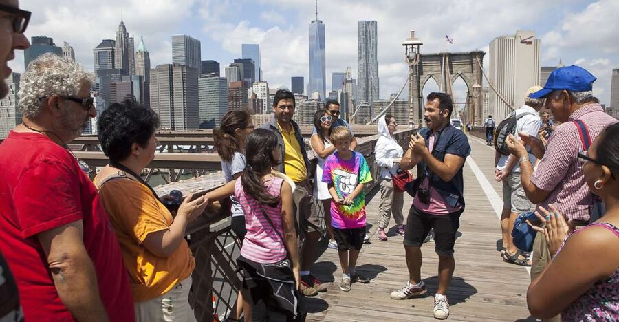 NYC: Brooklyn Bridge and Dumbo District Walking Tour - Crossing the Brooklyn Bridge with a story in your ears