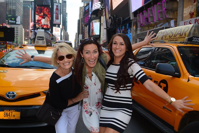 NYC Professional Photoshoot and Walking Tour with Private Guide - Times Square begins the two-hour route