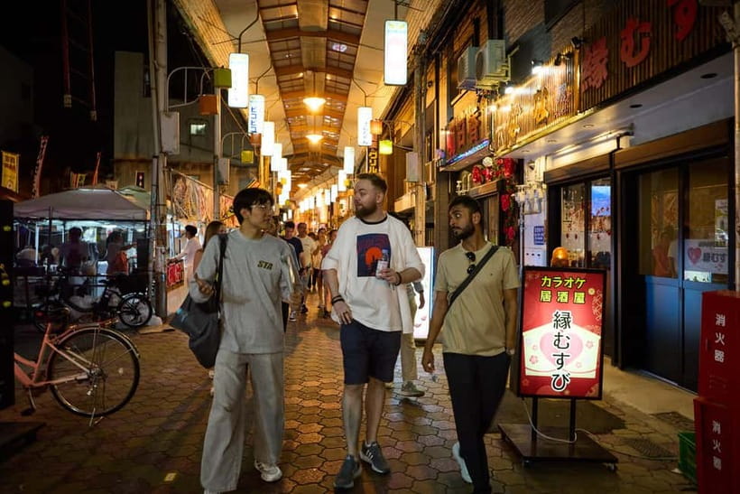 Osaka: Dark Side of Osaka Night Walking Tour - Group comfort, language, and physical demands